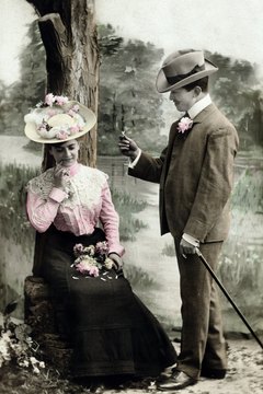 Young women of the Victorian era accessorized with flowers and bows to attract potential husbands.