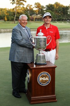 PGA of America President Allen Wronowski, left, and Keegan Bradley pose with the Wanamaker Trophy after Bradley's victory in the 2011 PGA Championship.
