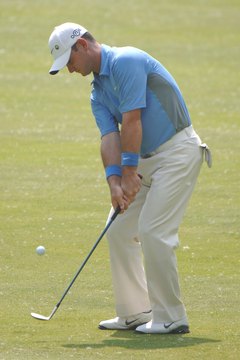 Stopping the ball with backspin is a key component of improving your golf score.