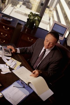 Businessman working in office, elevated view