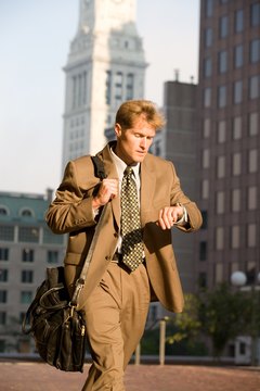 Businessman walking downtown