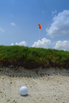 Many golfers' worst nightmare -- a ball in a sand trap.