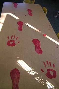 Tempra paint will wipe right off the tables.