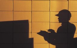 Comstock/Comstock/Getty Images Las empresas dan un control de rotación de inventario significativo a los proveedores con el inventario justo a tiempo.