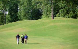 How to Hit a Golf Ball From a Severe Downslope How to Hit a Golf Ball From a Severe Downslope