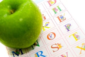 Apple and the alphabet. image by mashe from Fotolia.com In