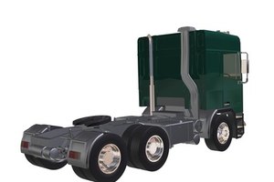 truck image by Goran Bogicevic from Fotolia.com A fifth-wheel hitch in the cargo bed of a travel trailer tow vehicle is very much like the one on this semi.