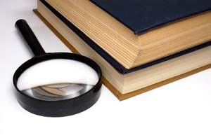 books on a table. image by Petr Gnuskin from Fotolia.com Scholarship