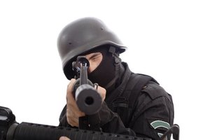 hardcore image by Andrey Kiselev from Fotolia.com Dealing with enemies can feel like absolute war, but taking a peaceful approach offers greater results and less probability of damage.