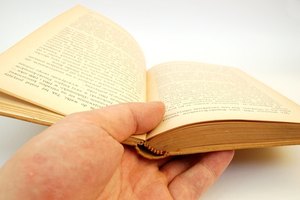 holding vintage book #3 image by Adam Borkowski from Fotolia.com Research