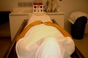 deceased image by Empath from Fotolia.com The next of kin is required to release a body to a funeral home or delegate the responsibility to a medical professional or caretaker.
