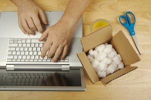 Businessman Works on Laptop - Packaging materials. image by Andy Dean from Fotolia.com Shipping a package through FedEx Ground is relatively simple, especially if you have a computer with Internet access and a printer.