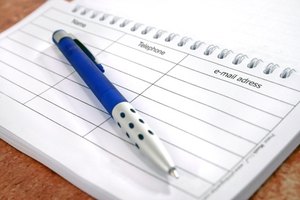 pencil on notes image by Kovac from Fotolia.com Create a chuch member directory so members will have quick access to fellow members' contact information.