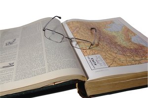 glasses and atlas image by Slobodan Djajic from Fotolia.com A