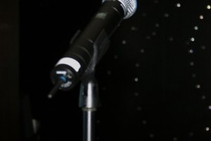 microphone image by dbvirago from Fotolia.com Write a good introduction of a presidential candidate's speech to keep the attention of the audience.
