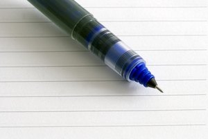 closeup notepad and pen image by sarit saliman from Fotolia.com The