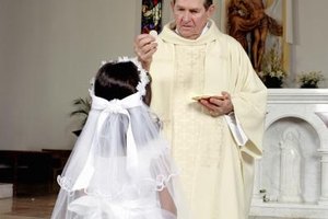 Digital Vision/Photodisc/Getty Images For Catholics, receiving Communion is an important step in strengthening their relationship with God.