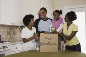 Jupiterimages/Brand X Pictures/Getty Images Taking time to explain poverty and showing practical ways to help can teach children to understand poverty better.
