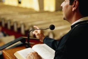 Stockbyte/Stockbyte/Getty Images Online seminaries offer both master's and doctor of divinity degrees, which are requirements for ordination.