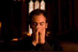 Jupiterimages/Photos.com/Getty Images While prayer can be done with any amount of people, congregational prayer is a great way to build unity.