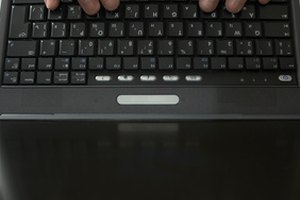hands on the laptop image by Alexey Klementiev from Fotolia.com Proper