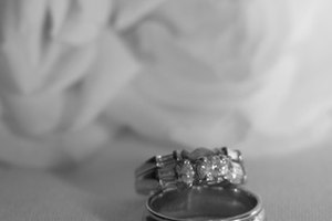 wedding bands, ring, marriage, bond, love image by Paul Retherford from Fotolia.com Before a couple says "I do" in a Catholic ceremony, the bride and the groom must present their sacramental records to the church.