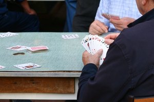 elderly people playing cards image by agno_agnus from Fotolia.com Assisted living facilities offer the aging a lot of opportunties to socialize while remaining independent.