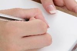 Writing Hands image by Jaimie Duplass from Fotolia.com Writing