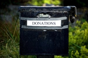 Donations image by Rebs O from Fotolia.com A nonprofit organization survives on donations from the public rather than profits from the sale of products or services.