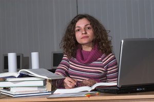 young student image by Petro Feketa from Fotolia.com Writers
