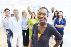 Robert Churchill/iStock/Getty Images Colleagues of different cultures working productively together may be one benefit of cultural pluralism.