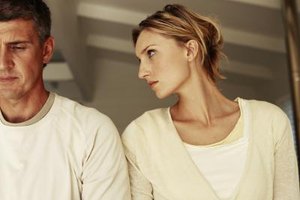 Stockbyte/Stockbyte/Getty Images A clingy boyfriend feels insecure or easily hurt when you don't spend the majority of your time with him.