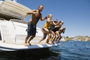 Jupiterimages/BananaStock/Getty Images Recreational boating often leads to swimming, and having a platform on the back of your vessel makes it easier to get on and off safely.