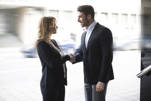freemixer/iStock/Getty Images Head high, shoulders back and a firm handshake -- your body language helps to convey your self-assurance.