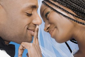 Visual Ideas/Camilo Morales/Blend Images/Getty Images Write your spouse a romantic letter that reminds you and her of why you fell in love in the first place.