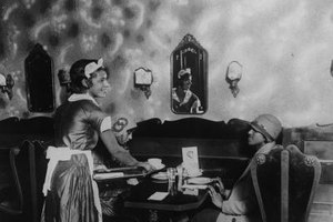 General Photographic Agency/Hulton Archive/Getty Images Harlem Renaissance women often adorned their bell-shaped cloche hats with appliqués, feathers, flowers or brooches.