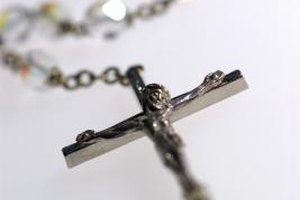 Thinkstock/Comstock/Getty Images The Catholic Church believes there is an eternal future for both body and soul, and prefers burial as a result.