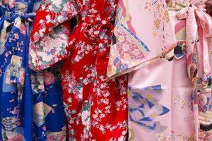 Jupiterimages/Photos.com/Getty Images Omamori charms, which resemble kimono fabric, are used to decorate backpacks, keychains and luggage.