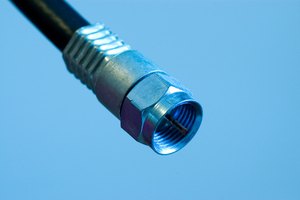 Mientras dejas el cable de alimentación conectado, remueve el cable coaxial del módem.