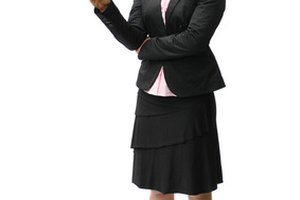 businesswoman shows something image by martin schmid from Fotolia.com Using