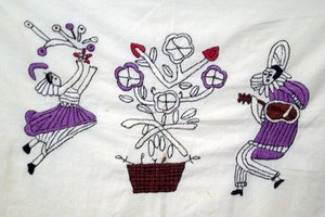 Transfiere tus diseños bordados originales a tarjetas de bordado y cose.