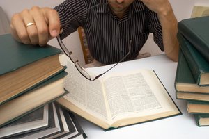 An image of man with books 7 image by Mykola Velychko from Fotolia.com You