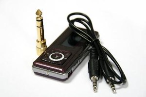 Puedes reproducir los archivos MP3 en tu automóvil mediante el uso de un transmisor digital de FM.