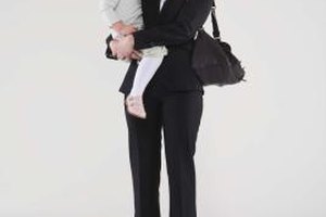 Jupiterimages/Polka Dot/Getty Images According to the U.S. Bureau of Labor Statistics, 47.5 percent of familes had two parents working in 2011.