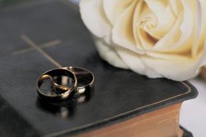 Digital Vision./Photodisc/Getty Images The church serves couples it weds by blessing their union and committing to help them flourish in their relationship.