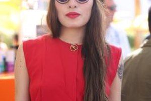 Chelsea Lauren/Getty Images Entertainment/Getty Images A free spirit resides within -- you can tell by the hip hair style, groovy shades and free-form blouse.