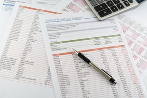 Jcomp/iStock/Getty Images Spending reports in personal finance management programs make tracking both easier and more accurate.