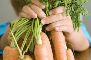 Las zanahorias actúa como una fibra soluble que asiste a la digestión.