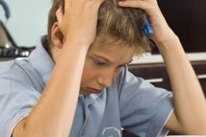 Jupiterimages/Pixland/Getty Images Language processing disorders can make it difficult for a gifted child to receive or express information.