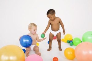Jupiterimages/Goodshoot/Getty Images Developmental milestones are intended as a guide, and not all babies will reach these stages at the same time.